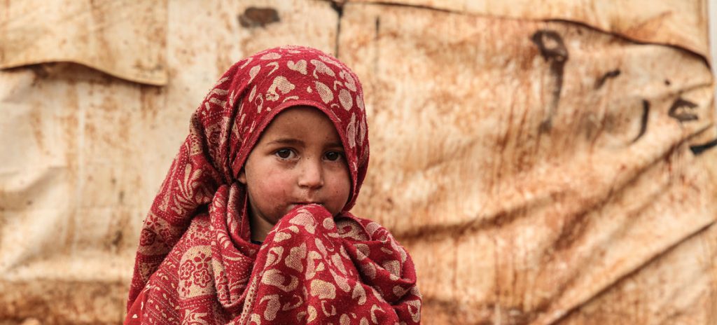 Menina no campo de deslocados internos Khair Al-Sham, na Síria. Foto: OCHA